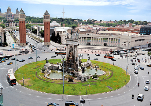 Barcelona, Spain - May 2018: Aerial view of Placa d'Espanya, towards the Venetian Towers and the National Art Museum. This iconic square is located at the foot of Montjuic and is an important landmark
