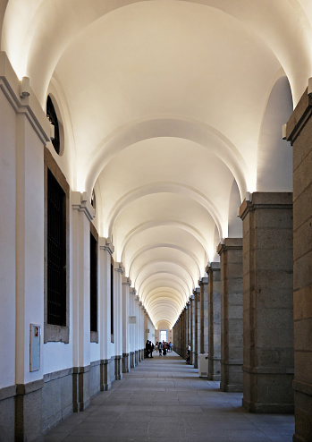 Rome  Italy - May 20 2011; Passageway to ornate entrance  with sunlight and shadows across hall