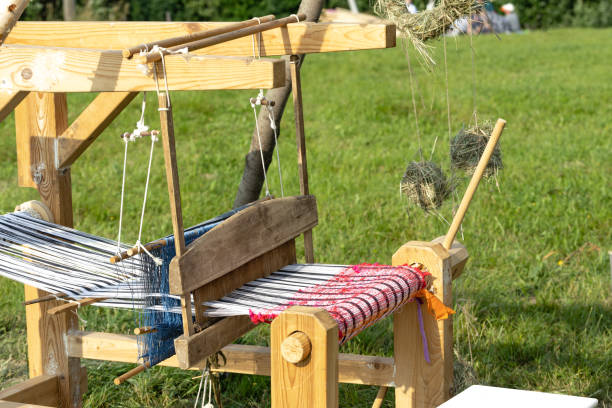 istock carpet loom parts on green grass 1410889787
