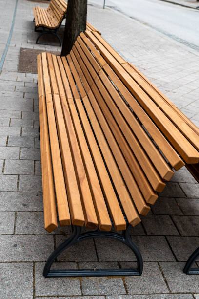 istock wooden benches in  the city 1410893049