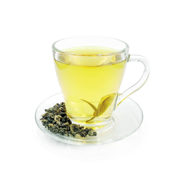 istock Green tea in glass cup isolated on white 1410894259