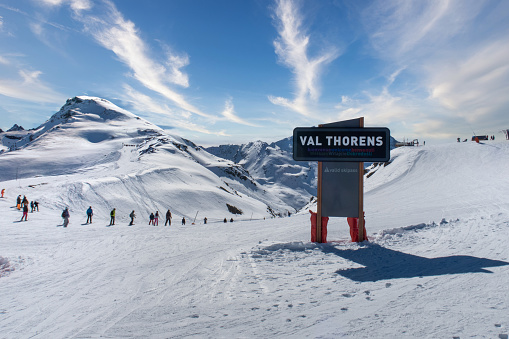 Val Thorens, France, April 6 2022, signpost to luxury town Val Thorens in skiing area trois valles translation: three valleys, horizontal shot