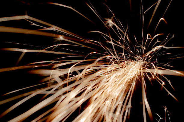 istock sparks in the dark. lines of light. 1410895788