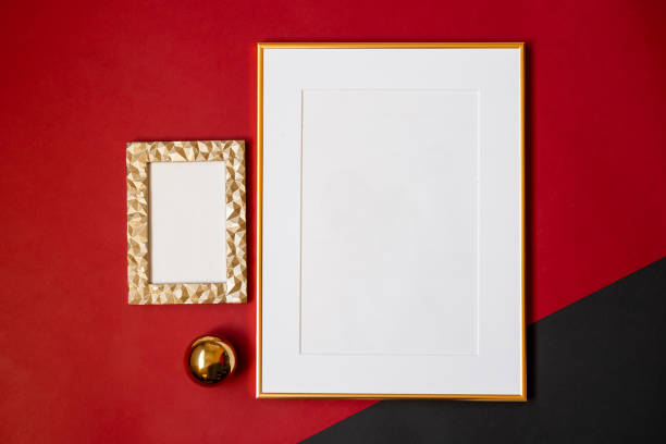 istock Mock up poster. Minimal template with empty picture frame mock up. Red background 1410897620