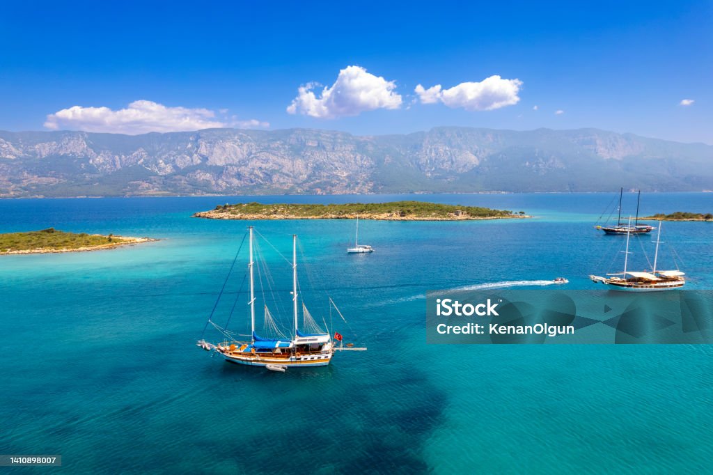 Daily boat trip. Blue voyage. Boat tour. Sedir island Ula, Muğla, Turkey. I took this photo in Akyaka Sedir island in Turkey. Bodrum Stock Photo
