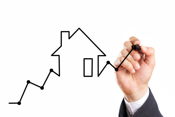 istock Businessman Drawing Mortgage Graph 1410898721