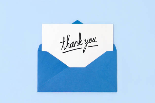Blue Envelope with Thank You Note stock photo
