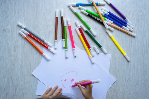 istock girl  making a drawing 1410899957