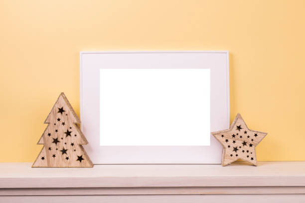 istock Mock up poster. Minimal template with empty picture frame mock up. Minimalist Christmas interior decoration 1410899975