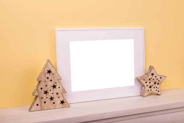 istock Mock up poster. Minimal template with empty picture frame mock up. Minimalist Christmas interior decoration 1410899980