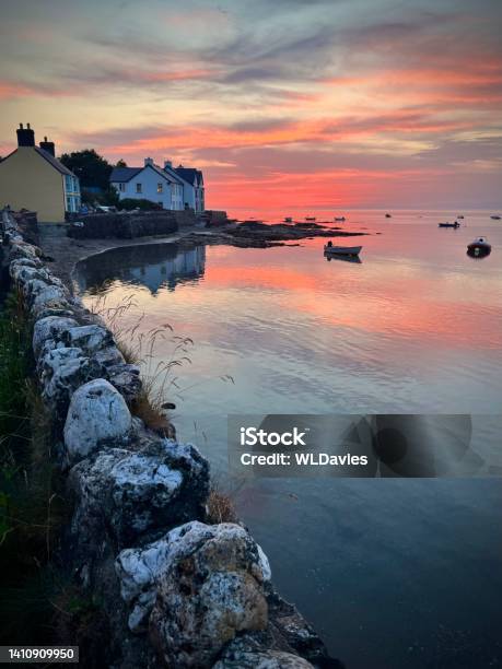 Sunset Over Coastal Homes Stock Photo - Download Image Now - Newport - Wales, Pembrokeshire, UK