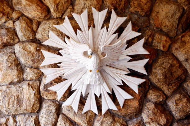 pentecost, representation of the holy spirit on stone background