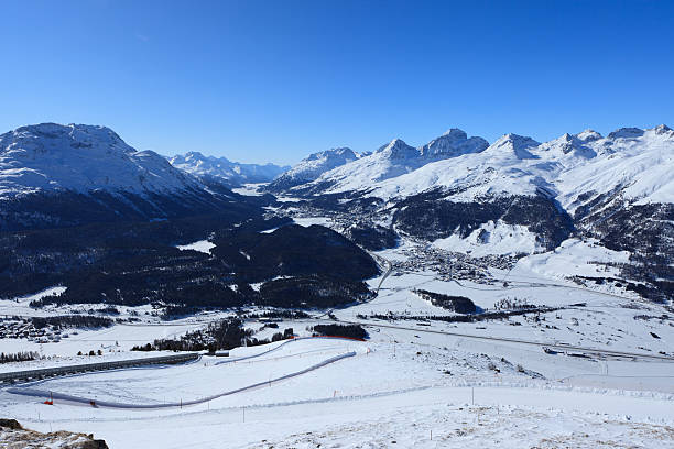 view from Muottas Muragl - Switzerland From Muottas Muragl 2'456m above sea level in the Engadin valley of Switzerland one can enjoy one of the best view in the Swiss Alps. samedan stock pictures, royalty-free photos & images