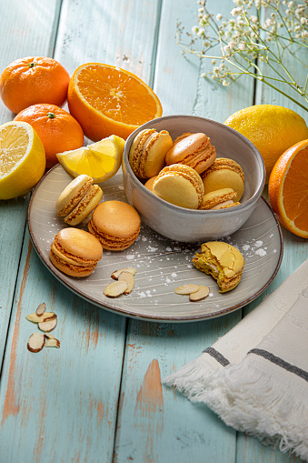Citrus Macaron cookies sweet pastry with orange and lemon stock photo