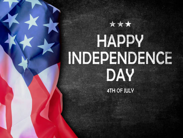 istock Text with happy independence day and usa flag on chalkboard 1410920706