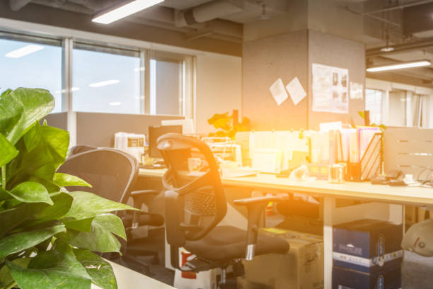 istock Modern business office  with blurred bokeh background. tables, chairs, computers. 1410927479