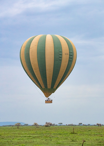 A hot air balloon takes off over Tanzania