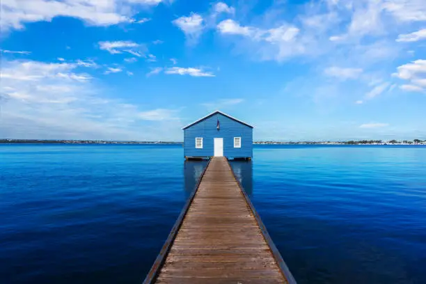 Photo of Charming blue boathouse at the end of a pier in Crawley, Western Australia
