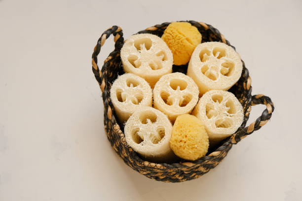istock cognac sponges and washcloths in a wicker basket on a light beige background.Zero waste Hygiene products. Eco friendly bio natural cosmetics.reasonable consumption 1410937952
