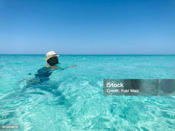 Man Swimming In A Blue Transparent Water On Varadero Beach Cuba Stock Photo - Download Image Now