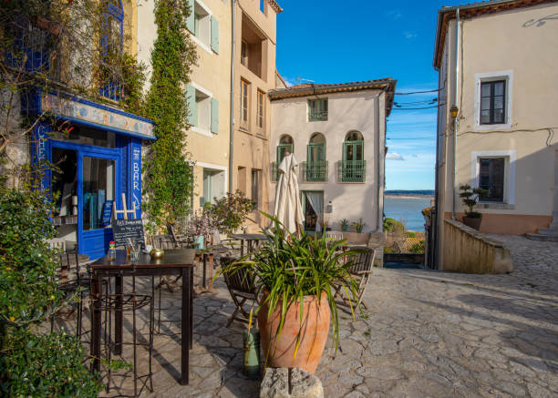 A square in the old village of Gruissan, Southern France stock photo
