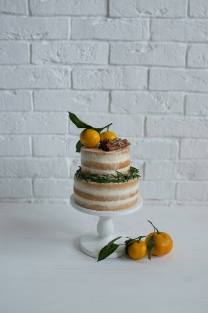 istock Delicious pastries decorated with tangerines and chocolate 1410945121
