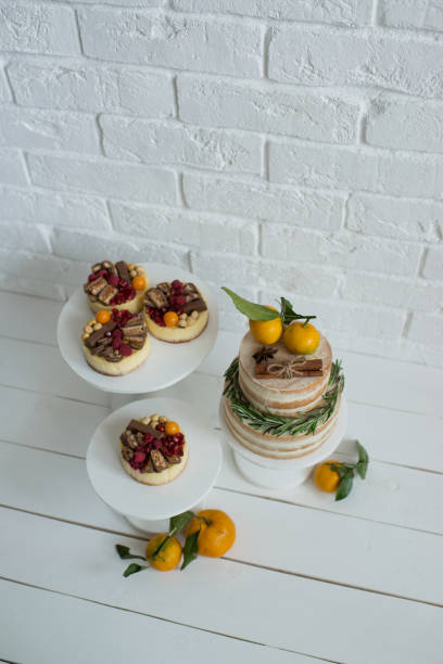 istock Delicious pastries decorated with tangerines and chocolate 1410945261
