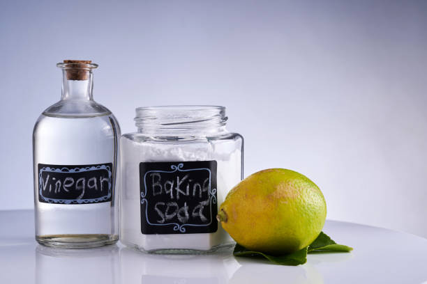 istock jar of  baking soda and white vinegar on  table top 1410949428