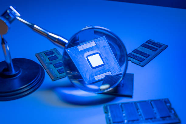 istock Close up of CPU on blue background 1410950198