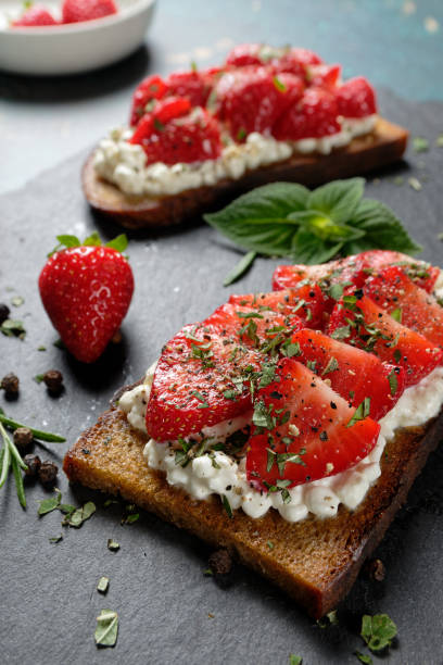 istock Fruity toast with strawberries on cottage cheese. 1410952978