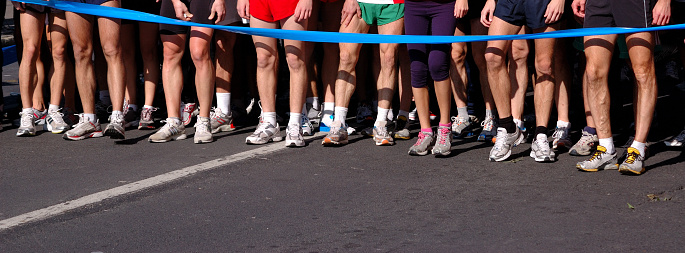 A group of runners in a cross country race.
