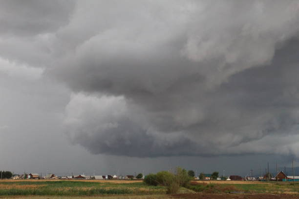 istock storm over the field in summer 1410957234