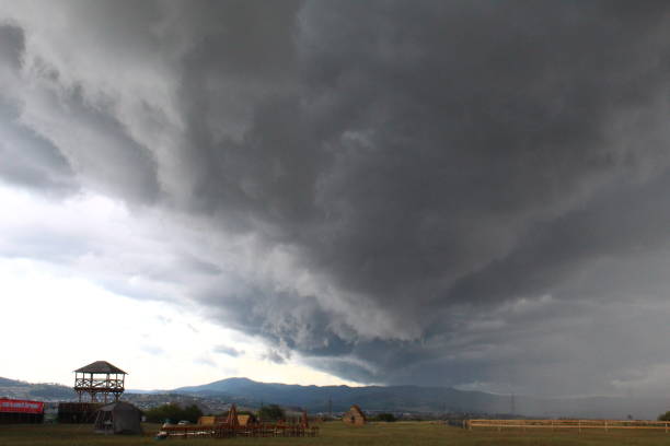 istock storm over the field in summer 1410957295