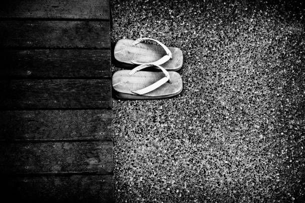 Modern lace kimono and traditional footwear worn by four friends, a high-angle close-up view. Kyoto, Japan.