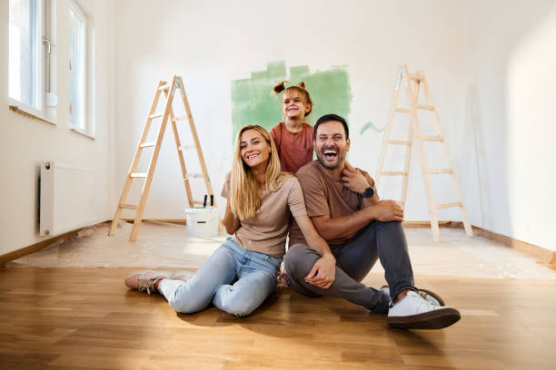 istock Cheerful family enjoying during home renovation process. 1410960807