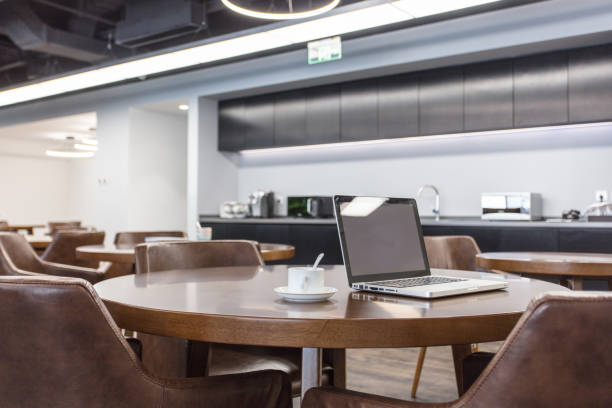 istock Coworking space with laptop and coffee 1410961185