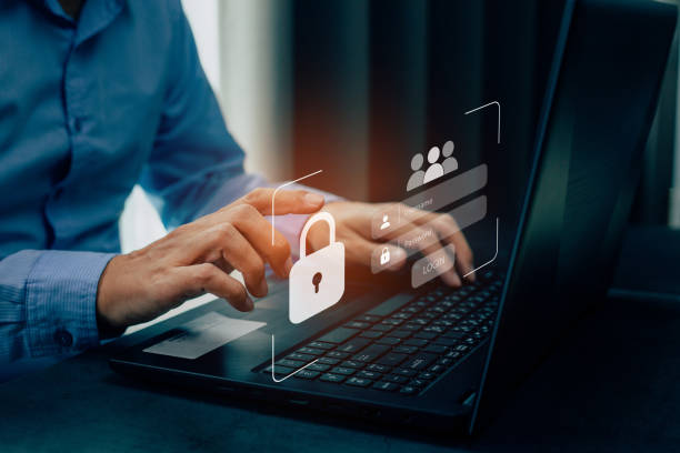 istock Businessmen protecting personal data on laptop and virtual interfaces. 1410963474