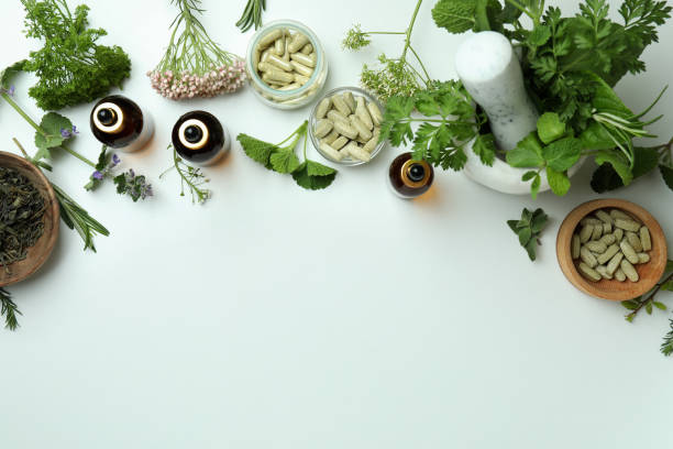 istock Concept of herbal medicine pills on white background, space for text 1410964595
