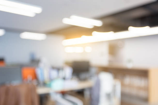 istock Abstract blurred interior of an empty modern loft office open space 1410966616