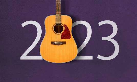 year 2023 with Acoustic guitar