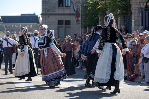Quimper, France - July 24 2022: Traditional dancers of the Danserien Kemper during the Cornouaille festival.
