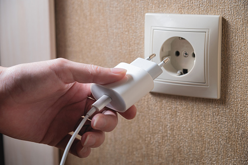 Turning off appliances that are not working saves energy. Unused phone chargers or power adapters. Plug the charging adapter into a European socket. Charging block yusb with interface type c.
