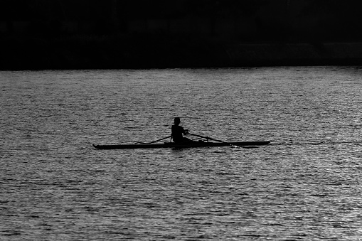 A rower rowing to the his home before the night has come, he’s never give up for his life, this photo has been made in the city of Makassar, he’s probably as fisherman