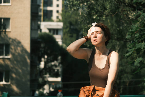 istock Woman suffering from heat wave 1410976471