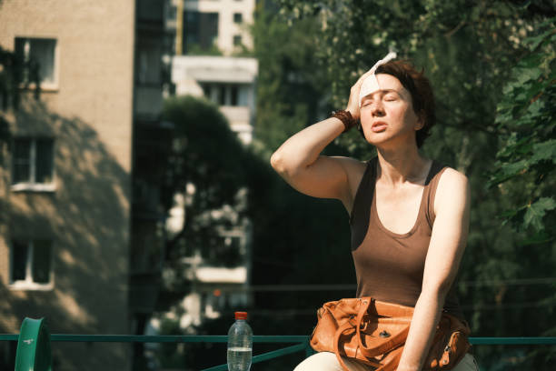 istock Woman suffering from heat wave 1410976486