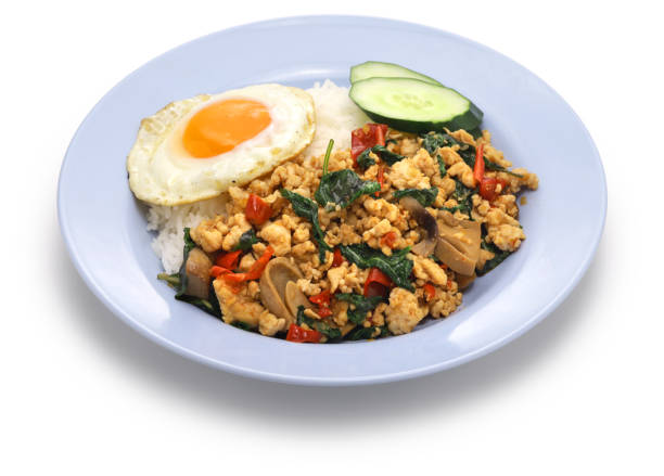 Thai basil chicken ( Gai Pad Krapow ) Thai holy basil chicken ( Gai Pad Krapow ) paddy straw mushroom stock pictures, royalty-free photos & images