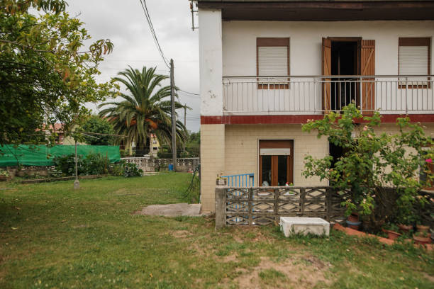 istock Old house with garden 1410979939