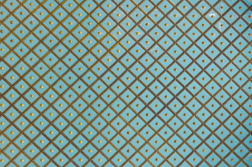 geometric tuchese background with gold ornament.