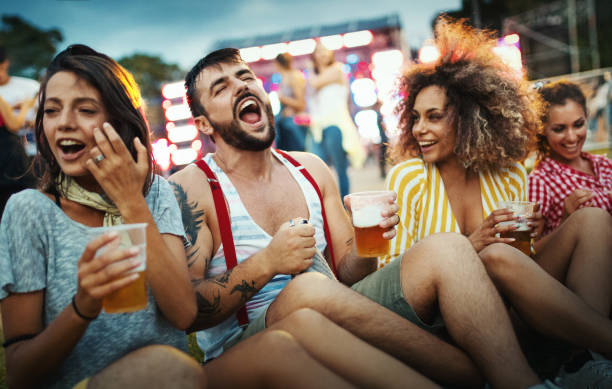 istock Group of friends chilling before a concert. 1410980076