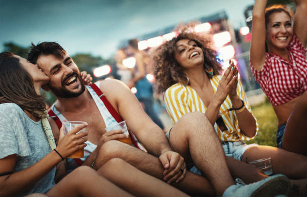 istock Group of friends chilling before a concert. 1410981247